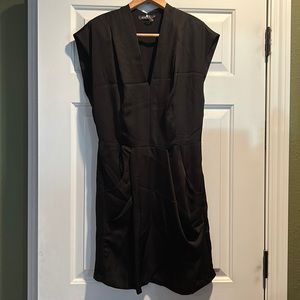 Little black sleeveless dress with pockets